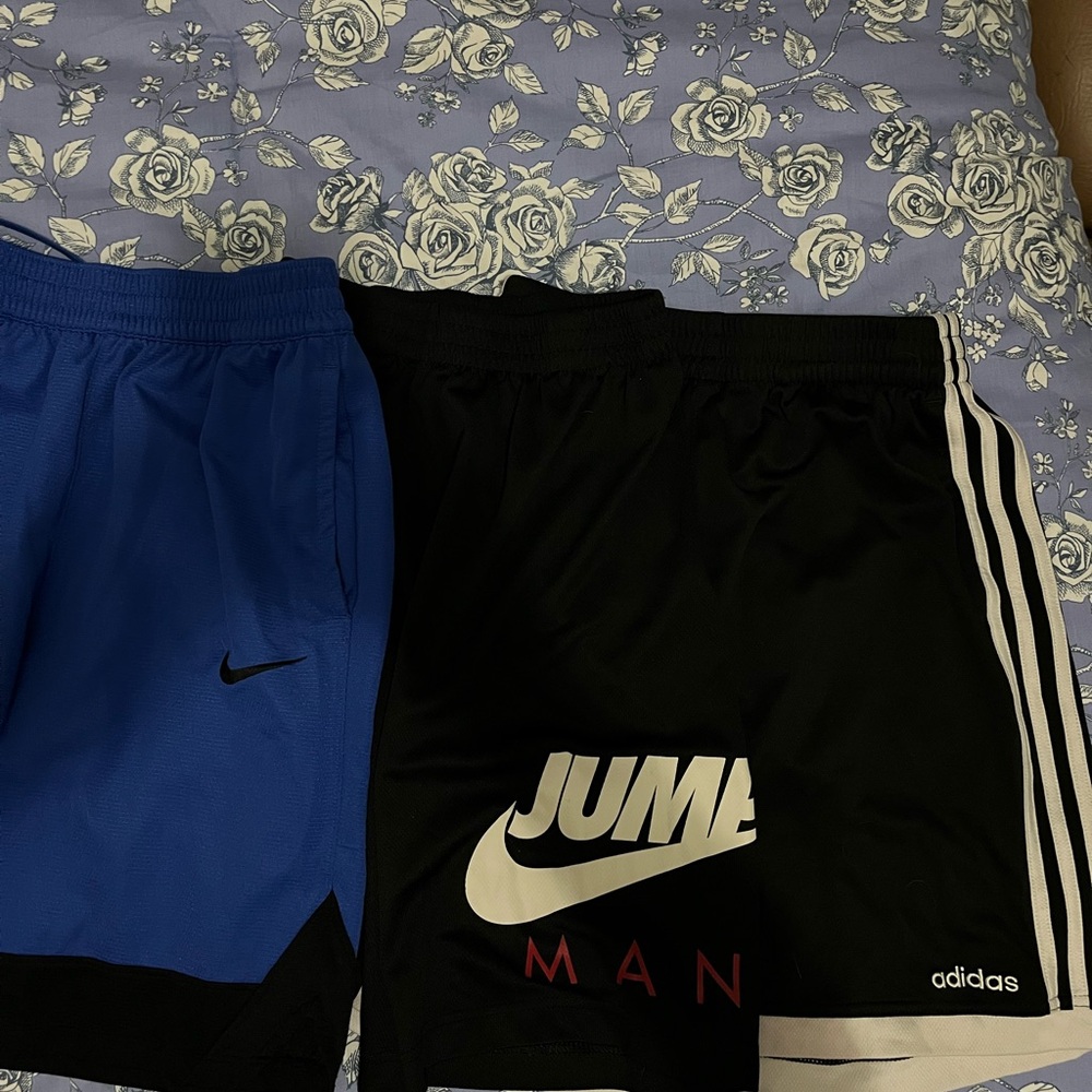 Blue Nike, Black Jordan and Black Adidas